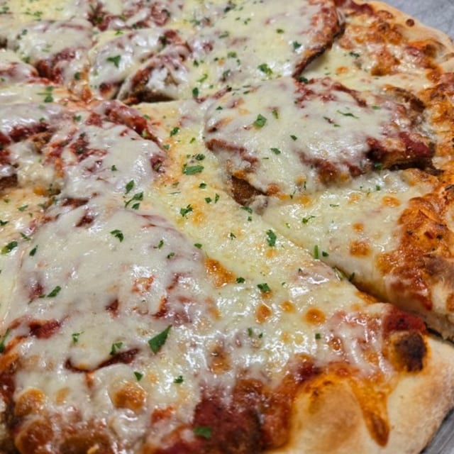 Chicken Parmigiana Pizza 16" Hand Tossed.